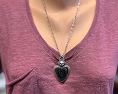 Fordite Sacred Heart with Skull