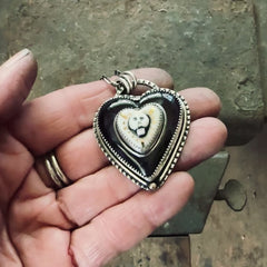 Porcelain Skull on Bowlerite Heart Necklace